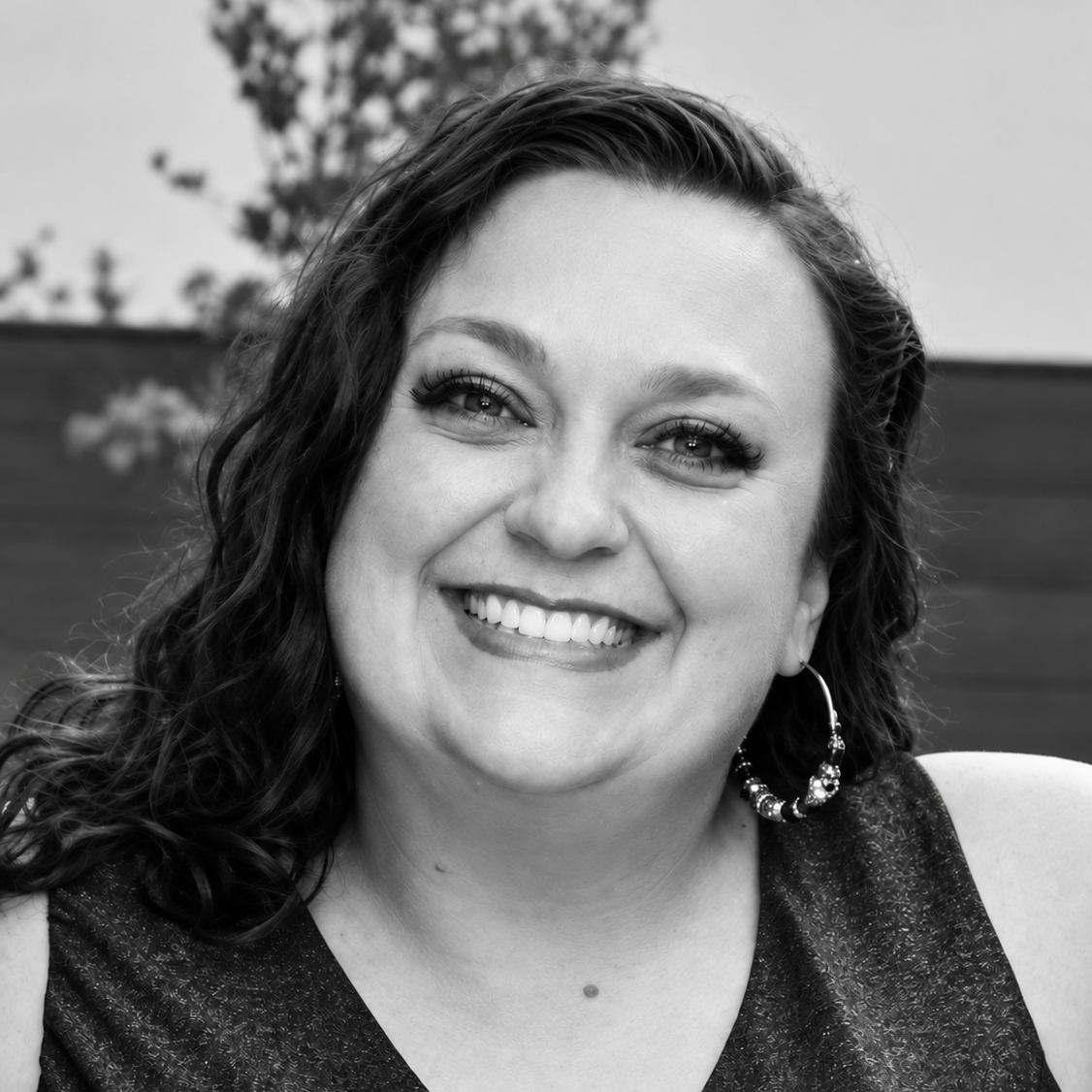 Black and white portrait of smiling woman